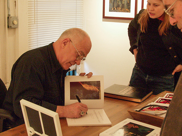 Allard book signing with girl nearby - another